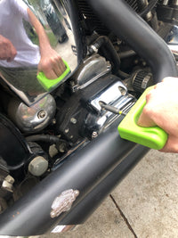 hammer fist hex key feature being used to fix motorcycle